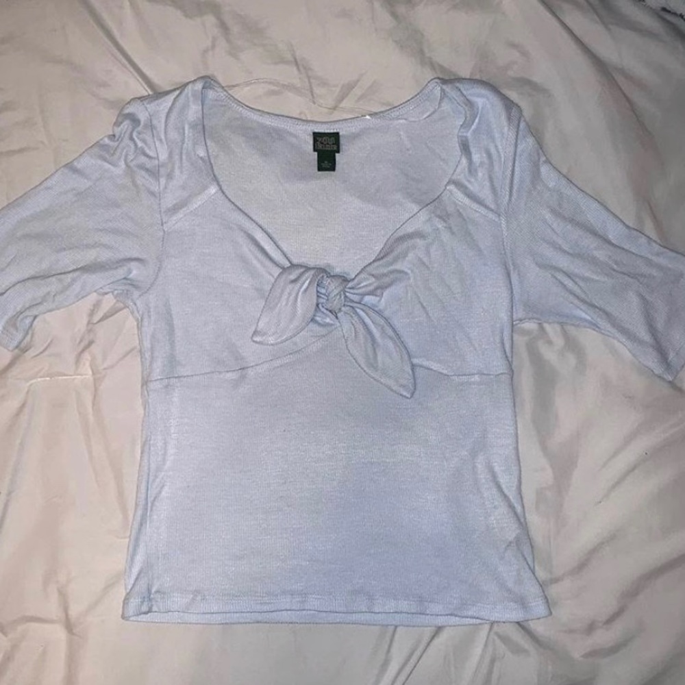 Light blue v-neck quarter sleeve